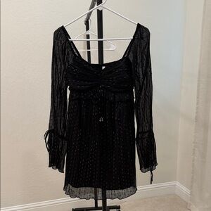 Black Long-Sleeve Mini Dress with Subtle Sparkle